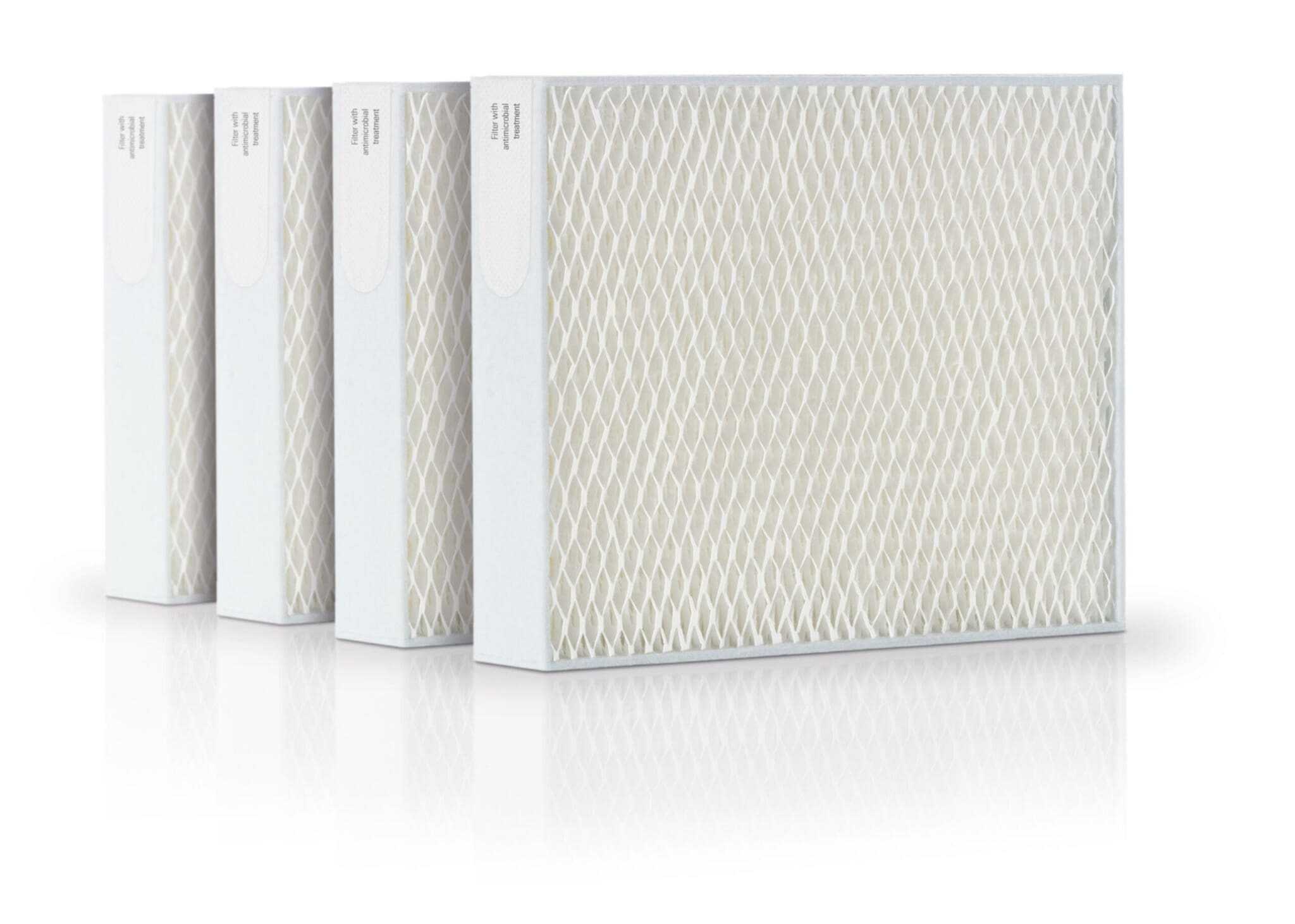 Filterset für Stadler Form Oskar & Karl Luftbefeuchter. Vier weiße Filter mit antimikrobieller Behandlung, isometrische Ansicht.