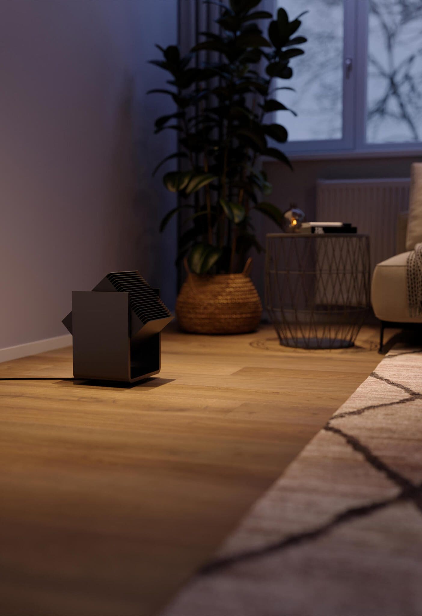 Stadler Form Alex Heizlüfter und Ventilator im modernen Wohnzimmer. Das Gerät ist weiß und hat eine 3D-Oszillation.