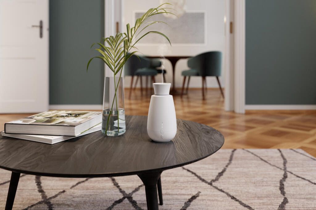 Aroma Diffuser Ella auf einem Beistelltisch im modernen Wohnzimmer