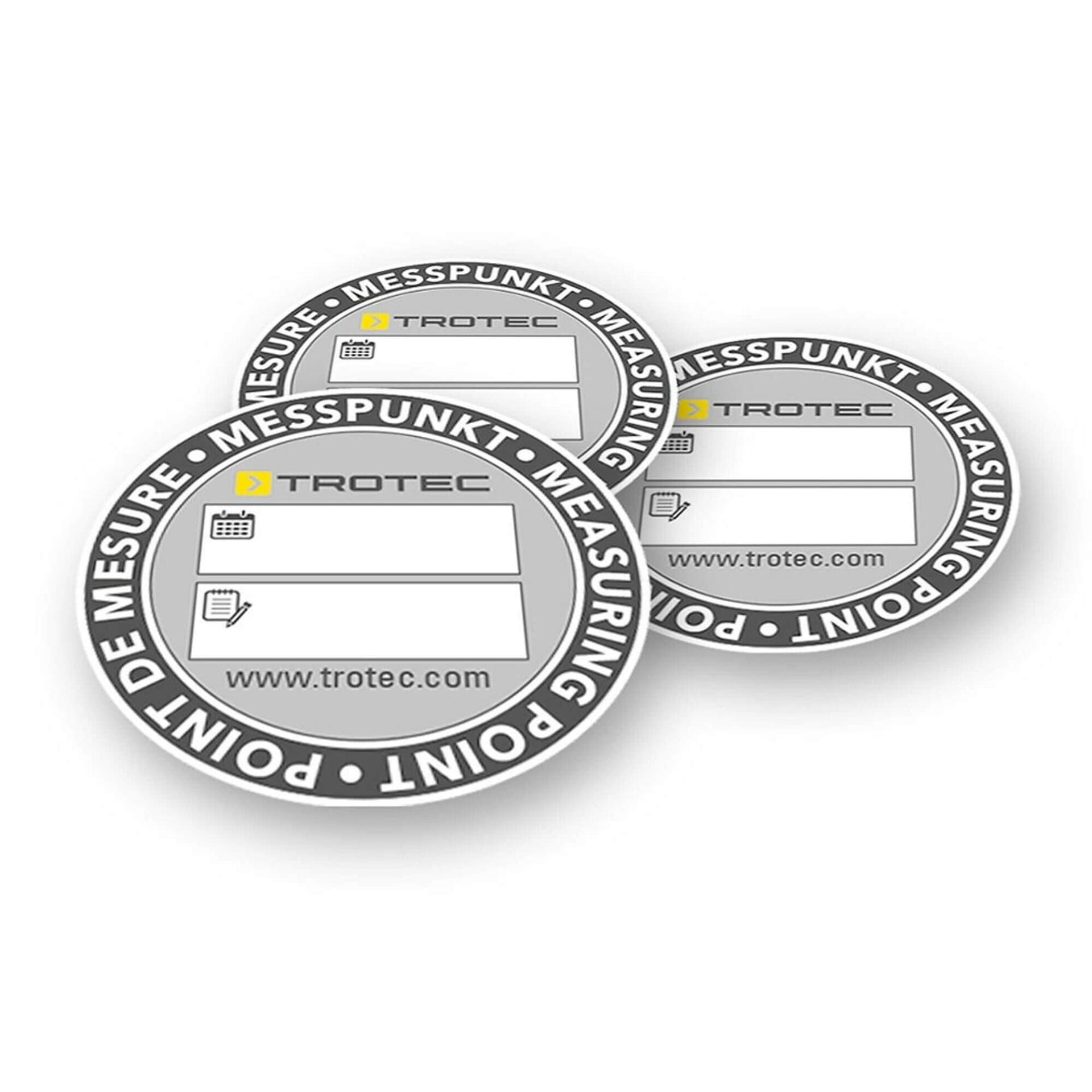 Drei runde Messpunkt-Aufkleber von Trotec, ideal zur Kennzeichnung und Dokumentation. 100 Stück im Set für präzise Messungen. Messpunkt-Aufkleber.