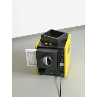 Ansicht Filterbox Prozesslufteintritt TTR 200. Die Filterbox in Gelb und Schwarz mit Lufteintrittsfilter ist auf dem Bild sichtbar.